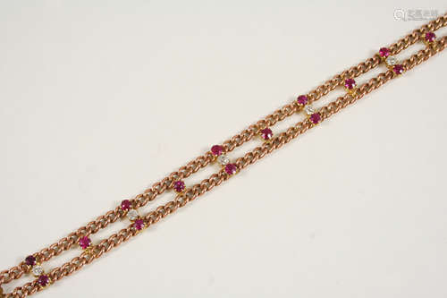 A GOLD, RUBY AND DIAMOND BRACELET the double row curb link bracelet is mounted with circular-cut