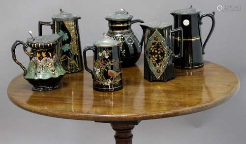 COLLECTION OF VICTORIAN JACKFIELD STYLE JUGS, various makers, each decorated on a rich, gloss