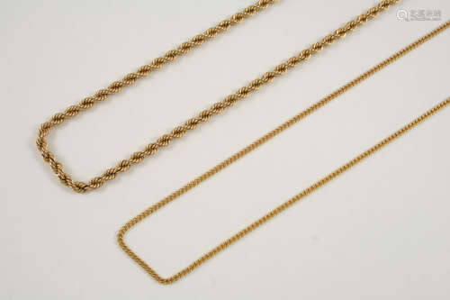 A 9CT. GOLD ROPE LINK NECKLACE 45cm. long, 27.5 grams, together with a 9ct. gold flat curb link