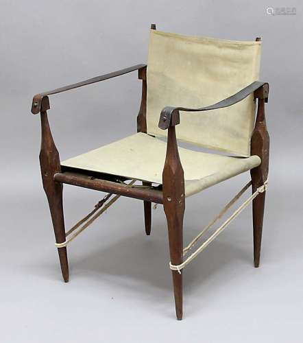 A SAFARI CHAIR - KAARE KLINT a vintage Safari Chair designed by Kaare Klint, the wooden framed chair