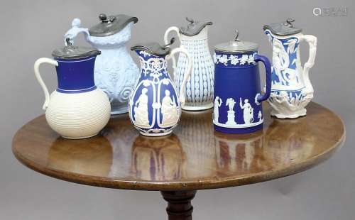 COLLECTION OF RELIEF MOULDED STONEWARE, JASPER AND PARIAN JUGS, mainly blue, to include Wedgwood,