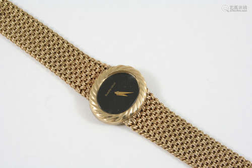 A LADY'S 9CT. GOLD WRISTWATCH BY BUECHE-GIROD the oval-shaped black dial signed Bueche-Girod, on