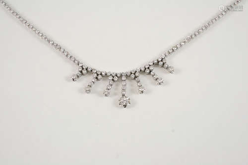 A DIAMOND DROP NECKLACE set overall with graduated brilliant-cut diamonds weighing between 9.00-10.