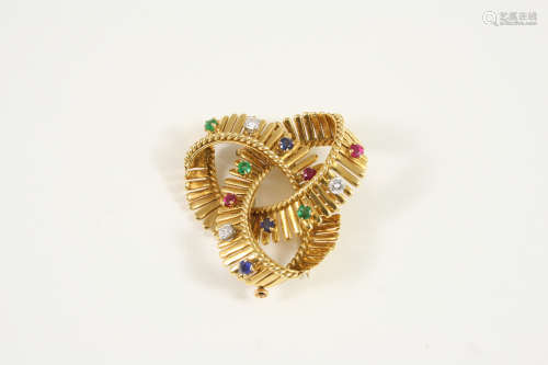 A GOLD, DIAMOND AND GEM SET BROOCH the gold trefoil abstract design is mounted with circular-cut