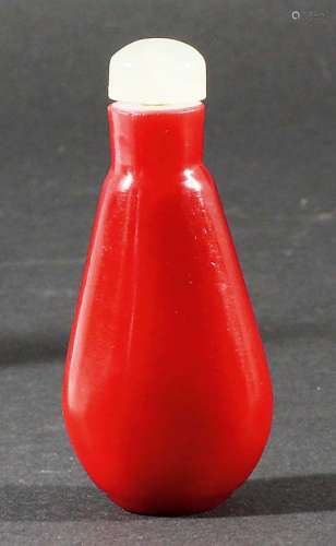 CHINESE BEIJING CORAL OVERLAY GLASS SNUFF BOTTLE AND STOPPER, of slender ovoid form, with pale
