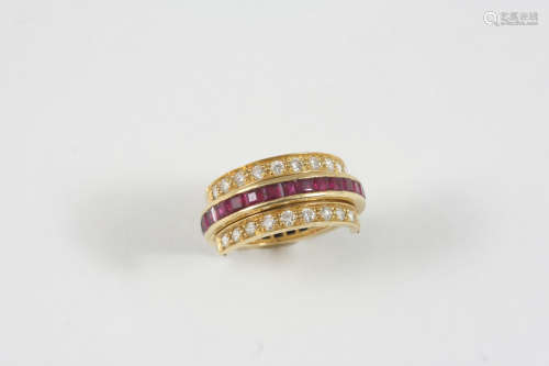 A DIAMOND, SAPPHIRE AND RUBY SWIVEL ETERNITY RING set with calibre-cut sapphires and rubies within a