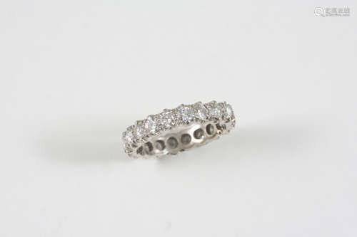 A DIAMOND FULL CIRCLE ETERNITY RING set with circular-cut diamonds weighing approximately 3.0 carats