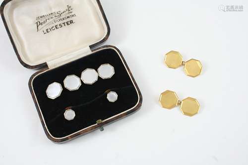 A PAIR OF 9CT. GOLD CUFFLINKS of octagonal shape with engine turned decoration, 3.8 grams,