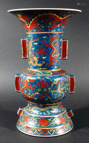 CHINESE GU VASE, MIng style but 20th century, green and red dragons on a blue ground, blue six
