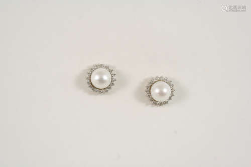 A PAIR OF DIAMOND AND CULTURED PEARL STUD EARRINGS each earring is set with a cultured pearl