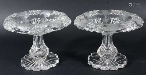 PAIR OF GLASS COMPORTS, 19th century, whell cut with fruiting vines interspersed with star cut