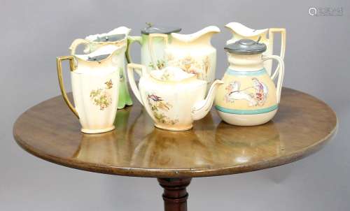 COLLECTION OF CROWN DUCAL AND SIMILAR JUGS, of various forms with printed and painted decoration