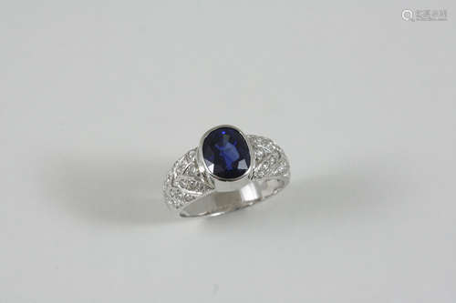 A SAPPHIRE AND DIAMOND RING the oval-shaped sapphire weighs approximately 3.0 carats and is set in