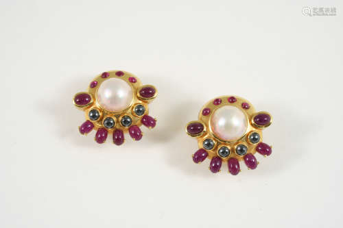 A PAIR OF MABE PEARL AND GEM SET CLIP EARRINGS each 18ct. gold earring is mounted with a mabe