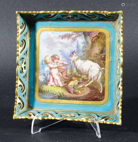 SEVRES SQUARE PORCELAIN DISH, probably 19th century, painted with a scene of cherubs and a goat