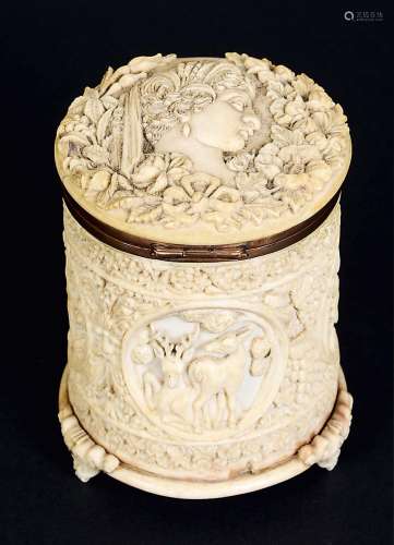 SRI LANKAN OR ANGLO-INDIAN IVORY CYLINDRICAL BOX AND COVER, circa 1800, carved with a profile