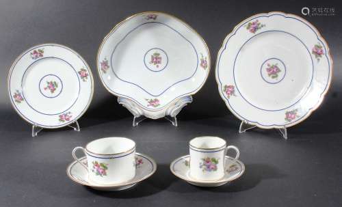 FRENCH PORCELAIN PART SERVICE, late 19th century, painted with rose sprigs inside gilt and blue