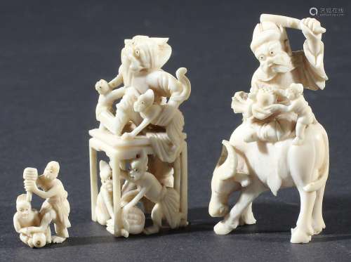 JAPANESE IVORY CARVING, 19th century, of an Immortal riding a buffalo, height 5.5cm; another of a
