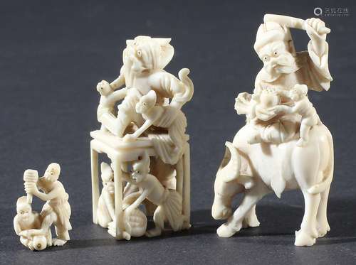 JAPANESE IVORY CARVING, 19th century, of an Immortal riding a buffalo, height 5.5cm; another of a