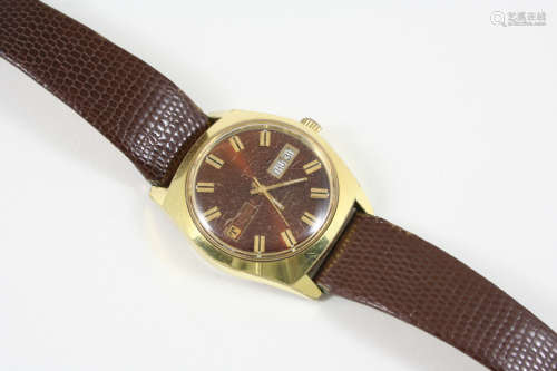 A GENTLEMAN'S STEEL AND GOLD PLATED AUTOMATIC SEASTAR WRISTWATCH BY TISSOT the signed circular brown