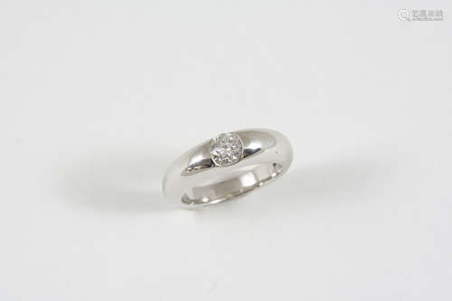 A DIAMOND SOLITAIRE RING set with a brilliant-cut diamond weighing 0.58 carats in platinum. Size M.