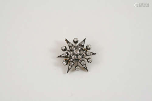 A VICTORIAN DIAMOND STAR BROOCH mounted with graduated old brilliant-cut diamonds, in silver and