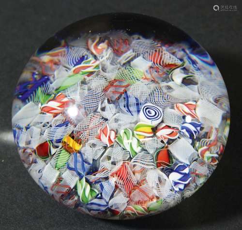 MILLEFIORI GLASS PAPERWEIGHT, probably 19th century and French, with scattered canes, diameter 7.