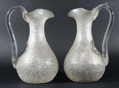 PAIR OF CRACKLE GLASS LEMONADE JUGS, late 19th century, of baluster form with clear glass handles,