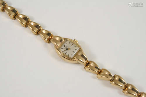 A LADY'S 9CT. GOLD WRISTWATCH BY TUDOR ROLEX the circular dial signed Tudor Royal, with dagger