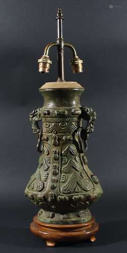 CHINESE ARCHAISTIC BRONZE VASE, of flattened baluster form with panels of stylised decoration