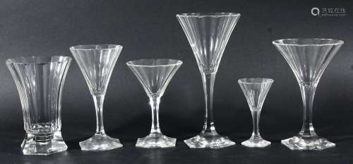 EXTENSIVE SUITE OF ART DECO STYLE DRINKING GLASSES, in the manner of Baccarat, each of faceted