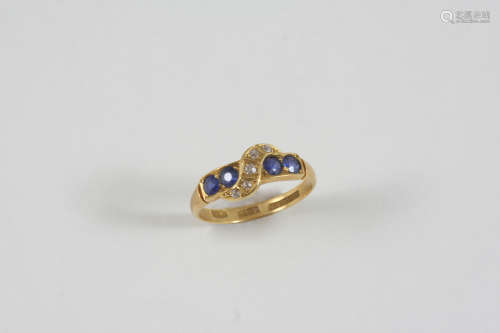 A SAPPHIRE AND DIAMOND RING the four circular-cut sapphires are mounted with five old-cut
