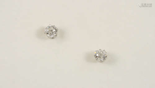 A PAIR OF DIAMOND STUD EARRINGS set with old cushion-cut diamonds weighing approximately 1.90 carats