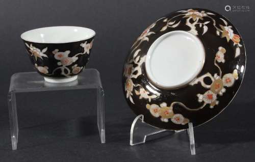 JAPANESE ARITA TEA BOWL AND SAUCER, possibly late 18th century, with iron red and gilt flowers on