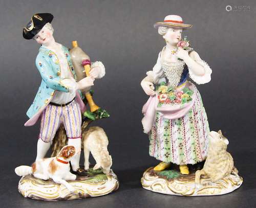 PAIR OF MEISSEN FIGURES, 19th century, he playing bagpipes she with her skirt full of flowers,