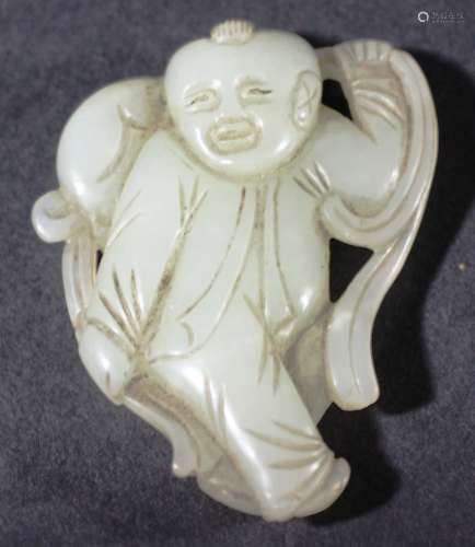 CHINESE NEPHRITE JADE FIGURE OF A CONFUCIAN BOY, carved walking and carrying a ball or bag, height