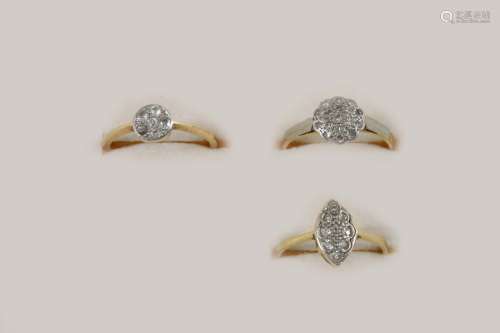 A DIAMOND CLUSTER RING millegrain set with single-cut diamonds in 18ct. gold and platinum, size O