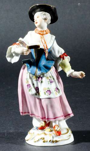 MEISSEN FIGURE OF A LADY SINGER, probably 20th century, modelled standing holding a book of music,