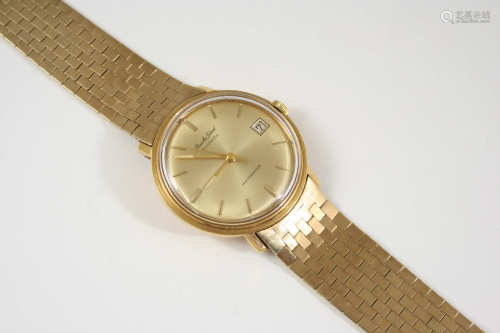 A GENTLEMAN'S 18CT. GOLD AUTOMATIC WRISTWATCH BY BEUCHE-GIROD the signed circular dial with baton