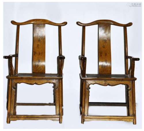 AN PAIR OF HUANGHUALI OR HARDWOOD 'FOUR-CORNERS-EXPOSED OFFICIAL'S HAT' ARMCHAIRS