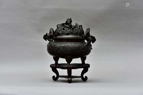 A LARGE CHINESE BRONZE TRIPOD CENSER AND COVER