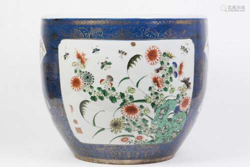 A LARGE BLUE-GROUND FAMILLE ROSE SCROLL POT