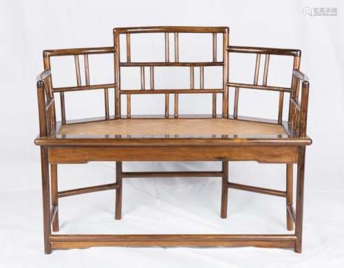 A CHINESE CARVED HUANGHUALI SETTEE