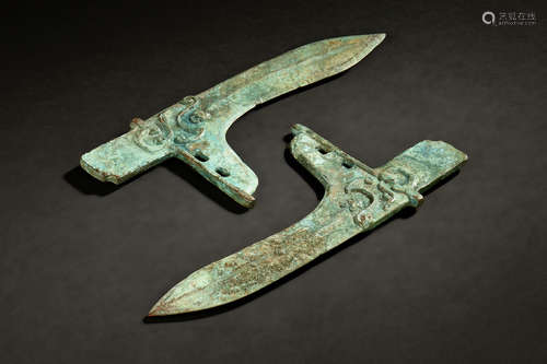 TWO ARCHAIC BRONZE DAGGER-AXE TIPS, GE