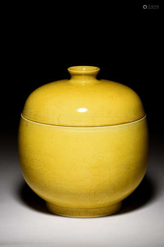 YELLOW GLAZED AND CARVED 'FLOWERS' JAR WITH COVER