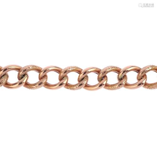 An early 20th century bracelet. Designed as a series of alternating textured and polished curb-