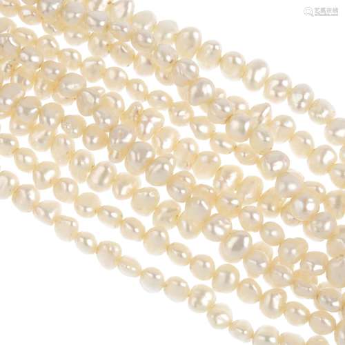 A freshwater cultured pearl multi-strand necklace. Comprising five strands of baroque freshwater