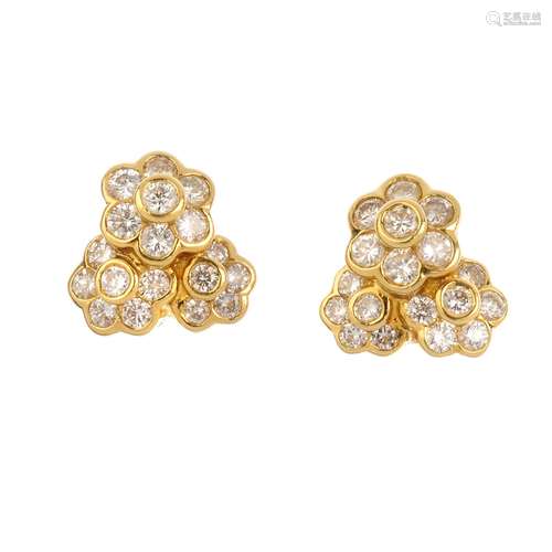 CLOGAU - a pair of diamond cluster earrings. Each designed as a brilliant-cut diamond floral cluster