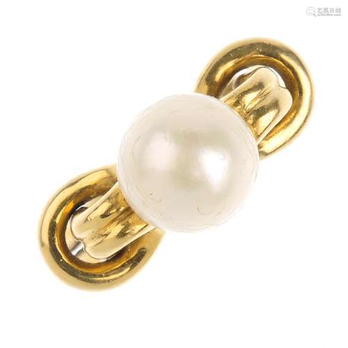 GUCCI - an 18ct gold cultured pearl ring. The cultured pearl, measuring 9mms, with looping