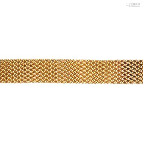 A 9ct gold bracelet. Designed as an interwoven bracelet. Hallmarks for Birmingham, 1992. Length 16.